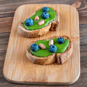 toast with spread on cutting board