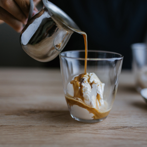 barrista pouring affogato 