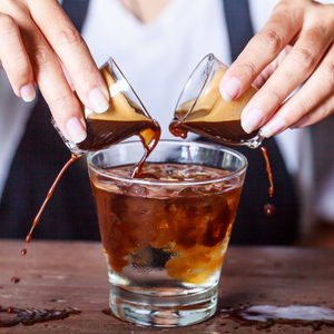Barrista pouring americano 