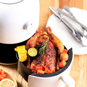 Air fryer with food inside