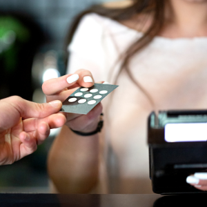 Girl giving loyalty punch card