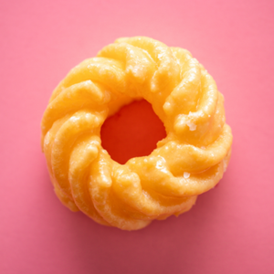 Crueller on a pink background