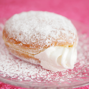 Filled donut on table