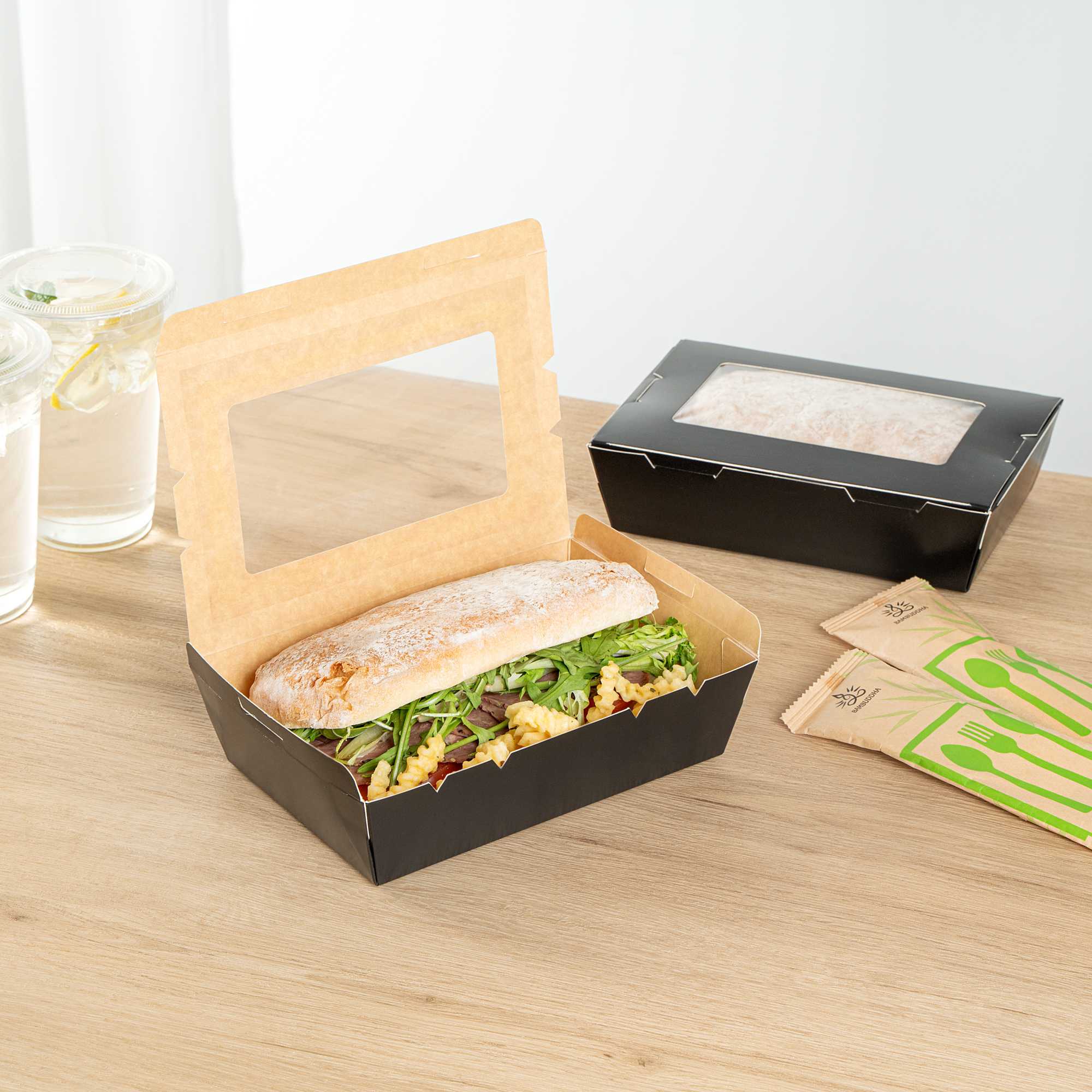 Cafe Vision 42 oz Black Paper Medium Take Out Container - Hinge Lock - 8" x 5 1/2" x 2" - 200 count box