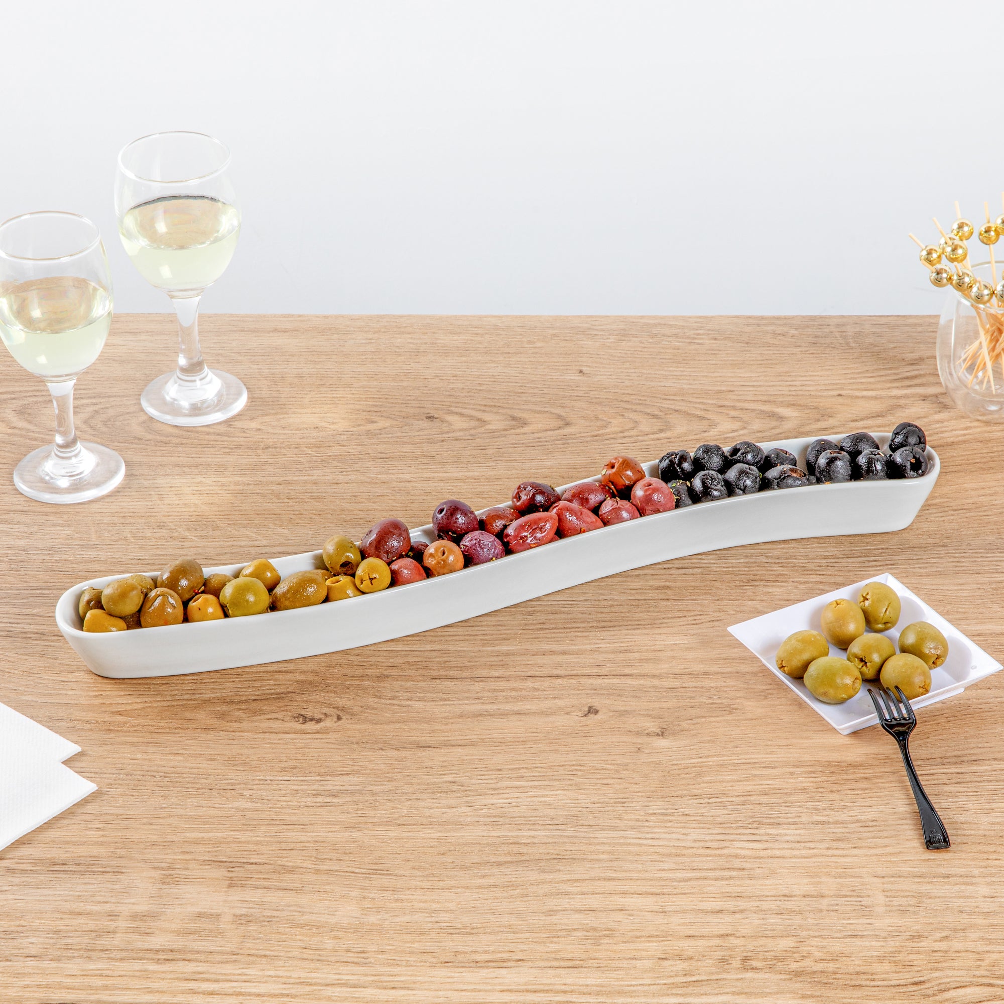 Chef 101 Swerve 14 oz Curved White Porcelain Olive Plate - 17" x 2 1/2" x 1 1/4" - 1 count box