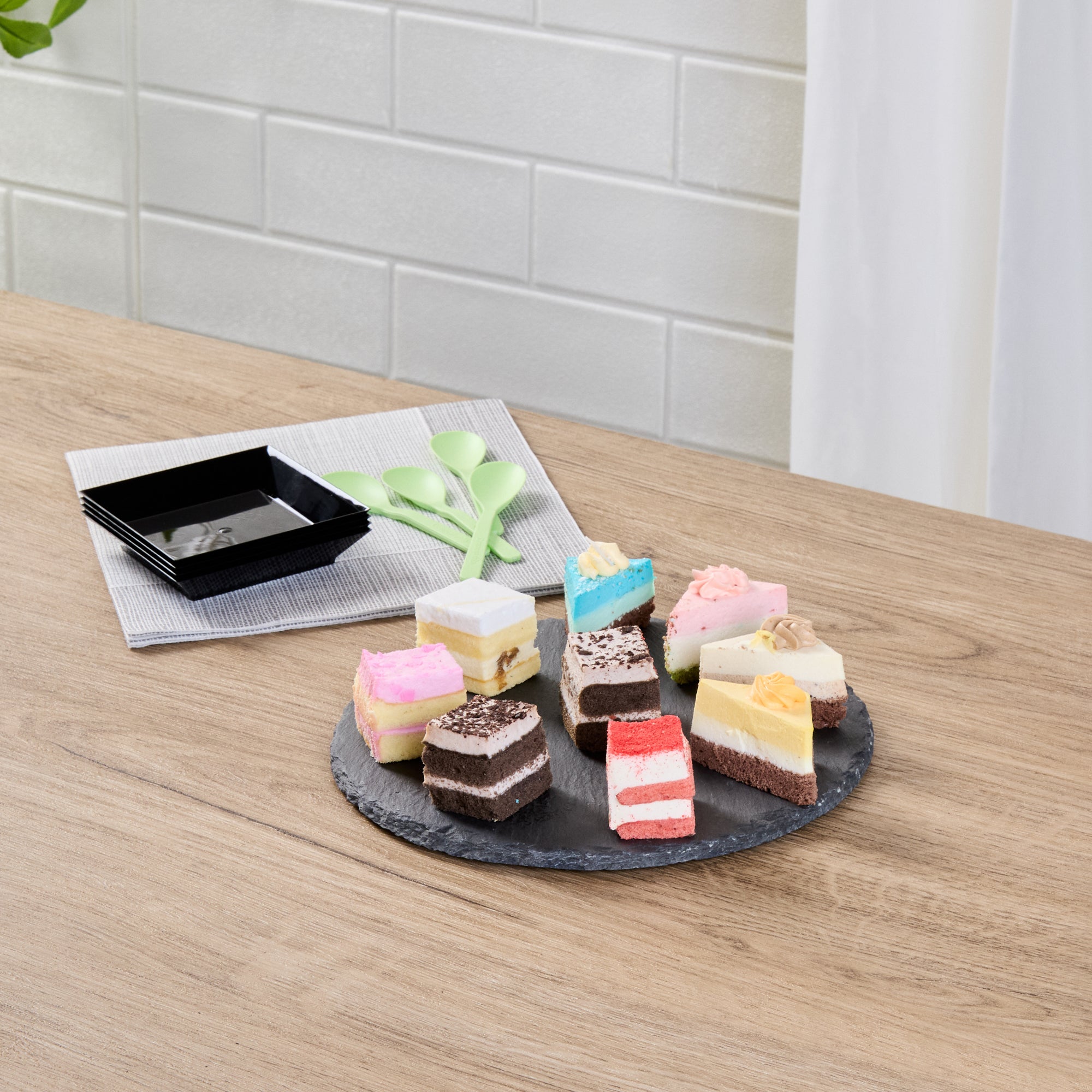 Stone Tek Round Black Slate Serving Plate - 7 3/4" x 7 3/4" - 10 count box