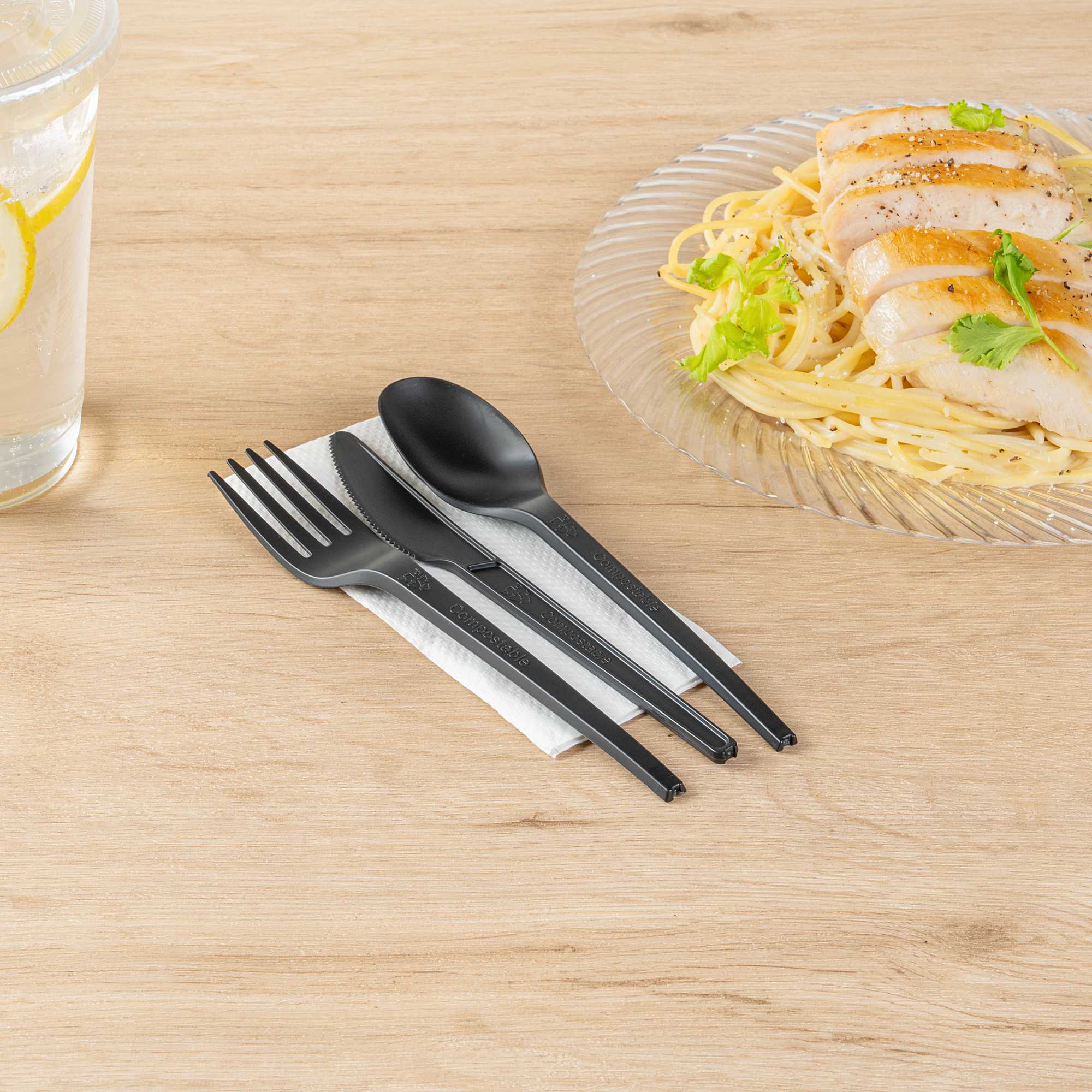 Basic Nature Black CPLA Plastic Cutlery Set - White Napkin, Heat-Resistant, Compostable - 8 3/4" x 2 3/4" x 3/4" - 100 count box