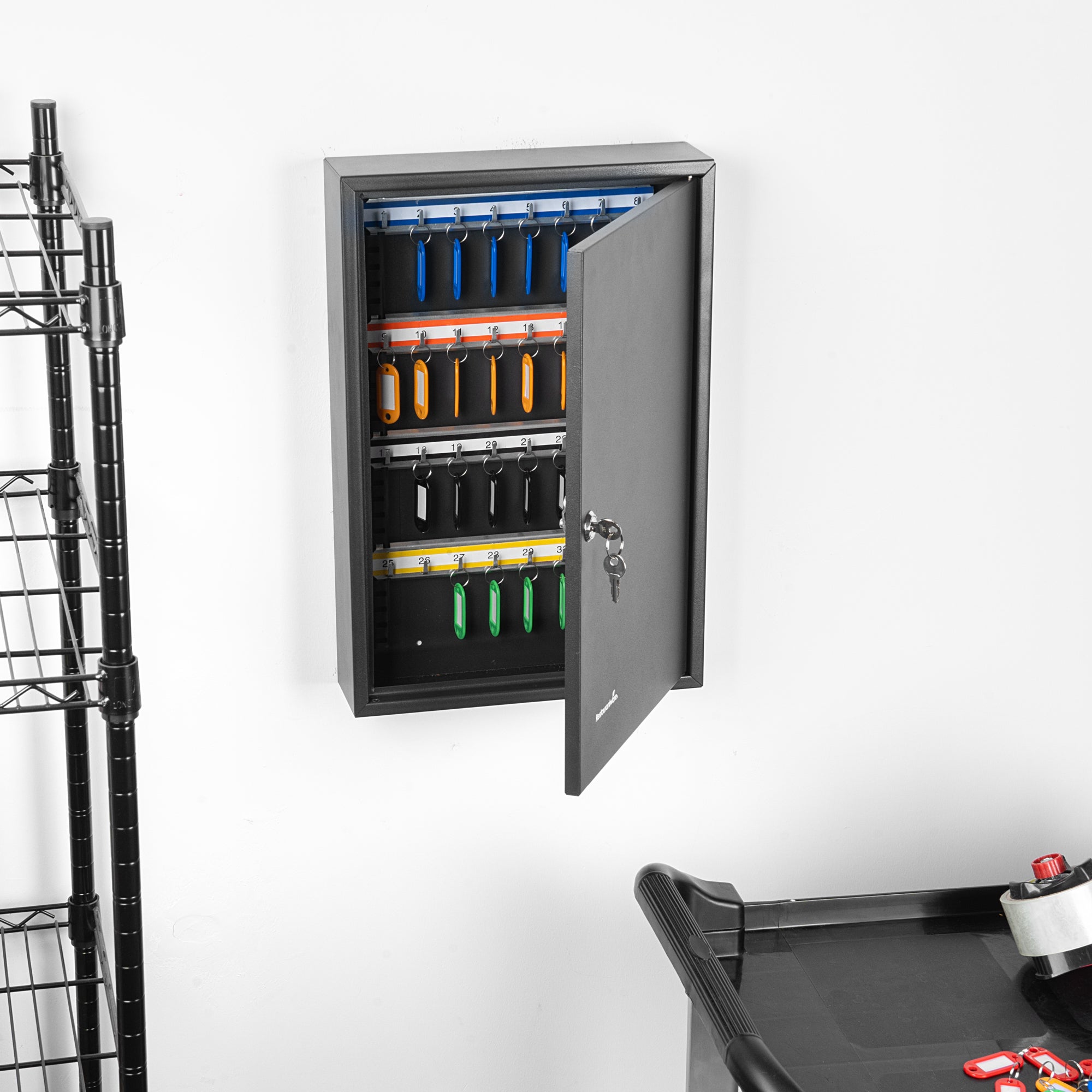 Be Safe Black Steel Wall Mount Key Cabinet Safe - For 64 Keys, with Key Lock, Labeled Shelves and Key Tags - 17 3/4" x 11 3/4" - 1 count box