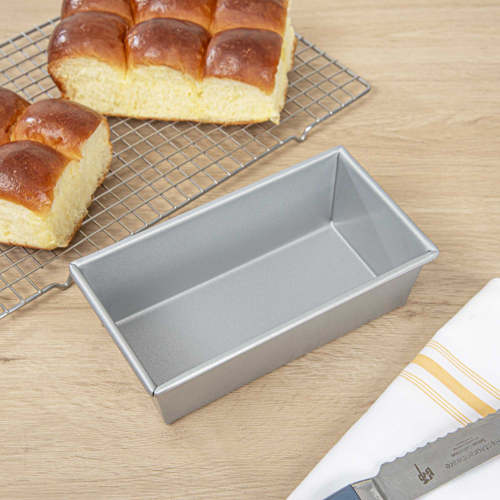 Pastry Tek 1 lb Glazed Aluminized Steel Bread Loaf Pan - 9" x 5" x 2 3/4" - 6 count box